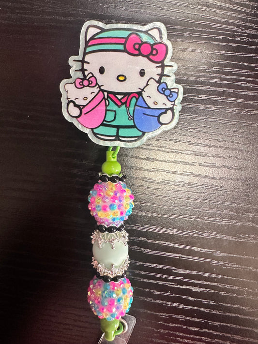 Hello Kitty Nurse & Twin Baby Badge Reel/Pop Socket